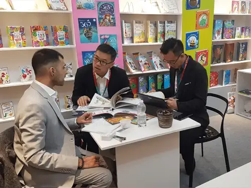 Rights meeting at the Buttercup stand, Bologna Children's Book Fair